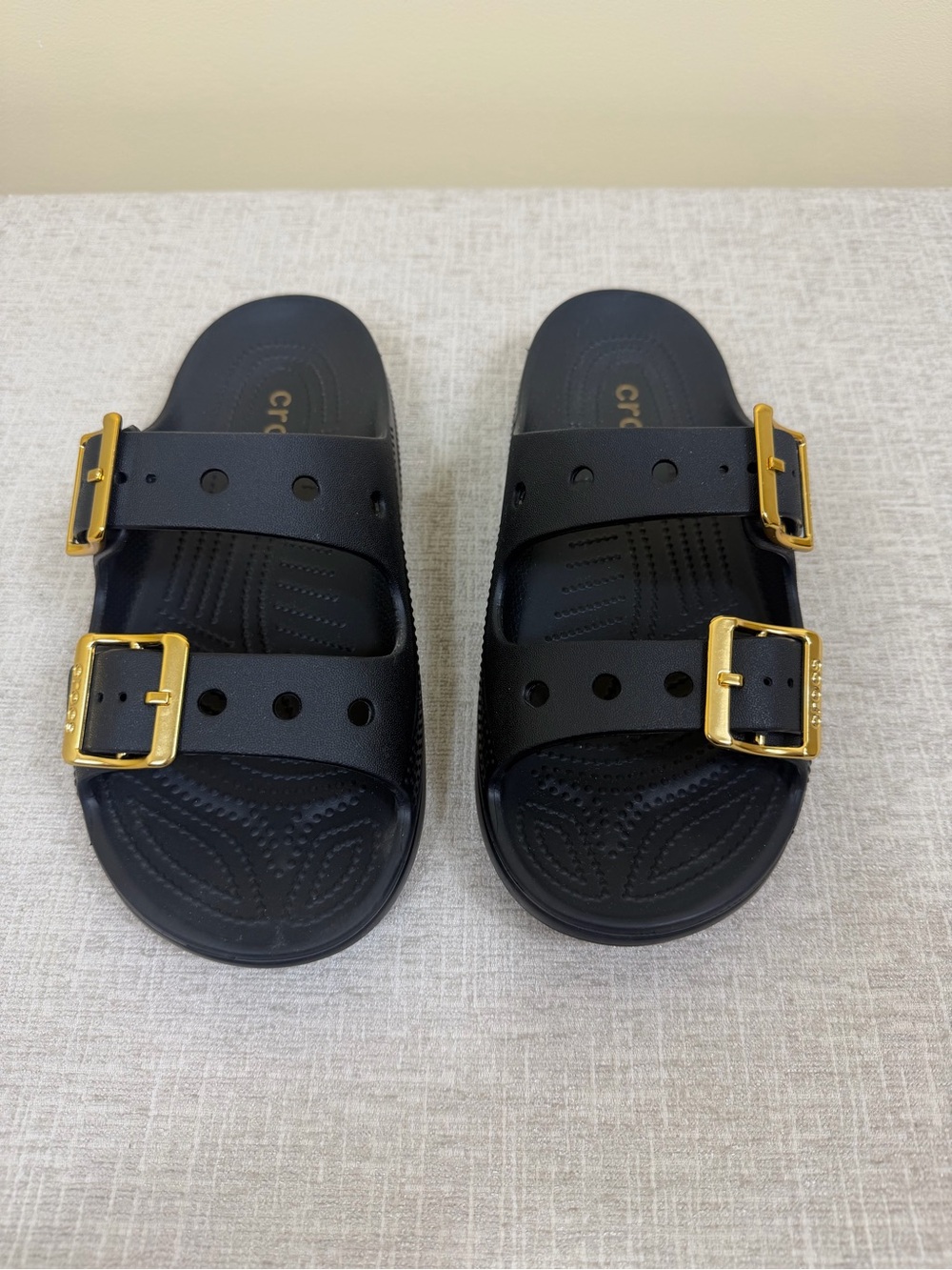 Crocs Women’s Black Slide Sandals with Gold Buckles Wore 1x. Size 7